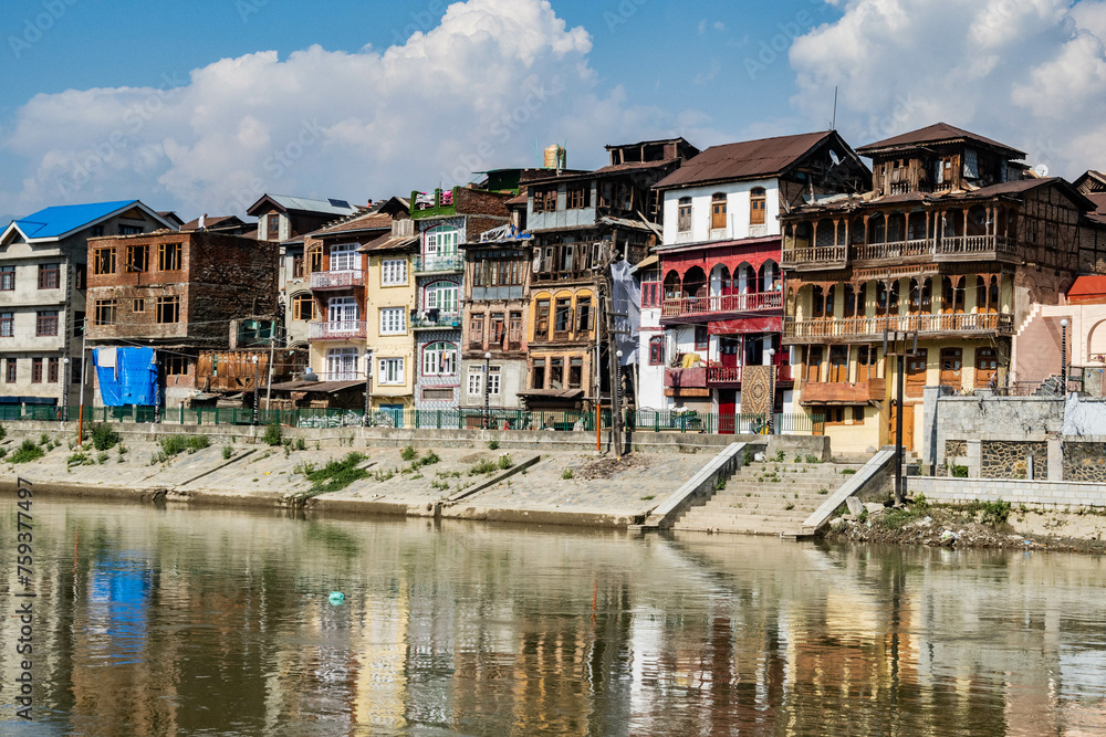 Crumbling old homes on the Jhelum River, Srinagar, Kashmir, India 