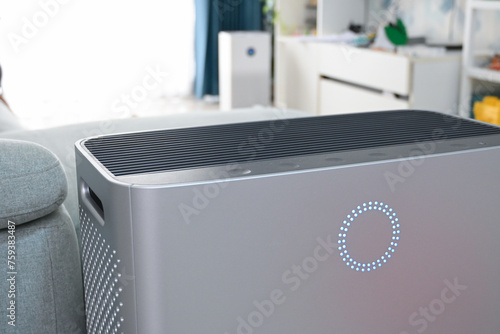 air purifier technology clean dust pm 2.5 in living room inside home for healthy care of respiratory system photo