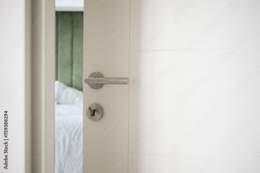 open door concept with Door handle and blur interior room background, open door concept with Door handle and blur interior room background,