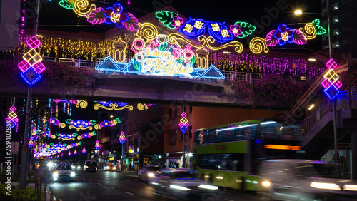 Geylang Serai Lights Up 2024: Celebrate Ramadan Holy Month of Muslims with Vibrant Street Decorations, Busy Roads Car Passing, and Festivities in Singapore, Eid Mubarak, Salam Aidilfitri Hari Raya photo