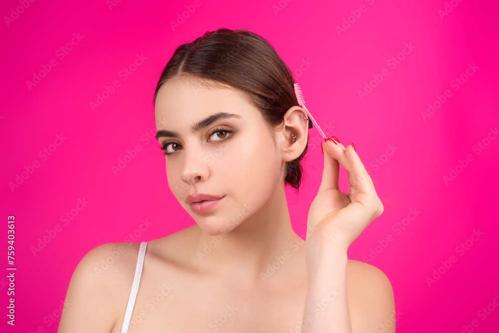 Eyebrow shape makeup. Beauty model shaping brows with brow pencil closeup. Womans mascara eyebrows with eyebrow brush. Natural make up. Modeling brows. Comb eyebrows. Eyebrow shape makeup. Beauty model shaping brows with brow pencil closeup. Womans mascara eyebrows with eyebrow brush. Natural make up. Modeling brows. Comb eyebrows.