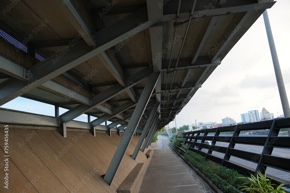 metal pipe a part of a bridge with a walkway, railway ,infrastructure elements metal pipe a part of a bridge with a walkway, railway ,infrastructure elements