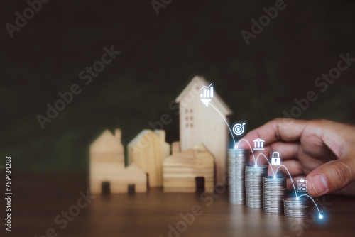 Hand choose coins pile stack graph with business symbols icons for real estate or money savings plan ideas and investment planning goal to growth and bank home loan or financial insurance.