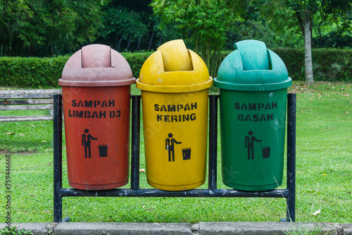 Trash bin with text 