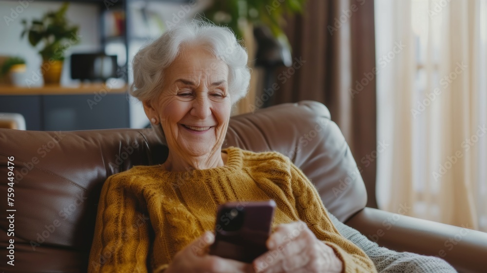 Happy senior female holding smartphone using mobile phone app. Technology, communication, happy adult woman with smartphone at home, recreation, communication, sociality, hobbies, adaptation Happy senior female holding smartphone using mobile phone app. Technology, communication, happy adult woman with smartphone at home, recreation, communication, sociality, hobbies, adaptation
