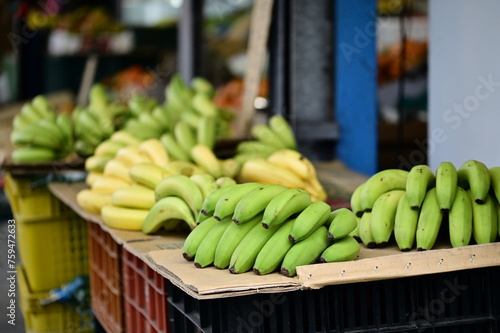 In Taiwanese markets, fruit stalls offer fresh fruits like bananas. Fruits are delicious and nutritious, essential for daily nutrition.