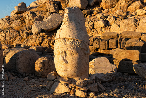 Monumental head of King Antiochus at sunset, Mount Nemrut in Turkey,UNESCO
