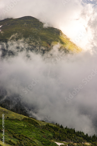 Dramatic clouds engulfing the mountains in Rocky Mountain National Park, Colorado © Tushar Turkar