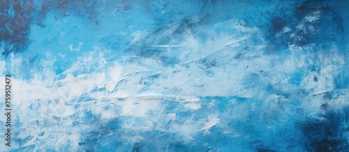 An electric blue and white painting featuring a cumulus pattern on a wall. The natural landscape art showcases symmetry, blending science and visual arts