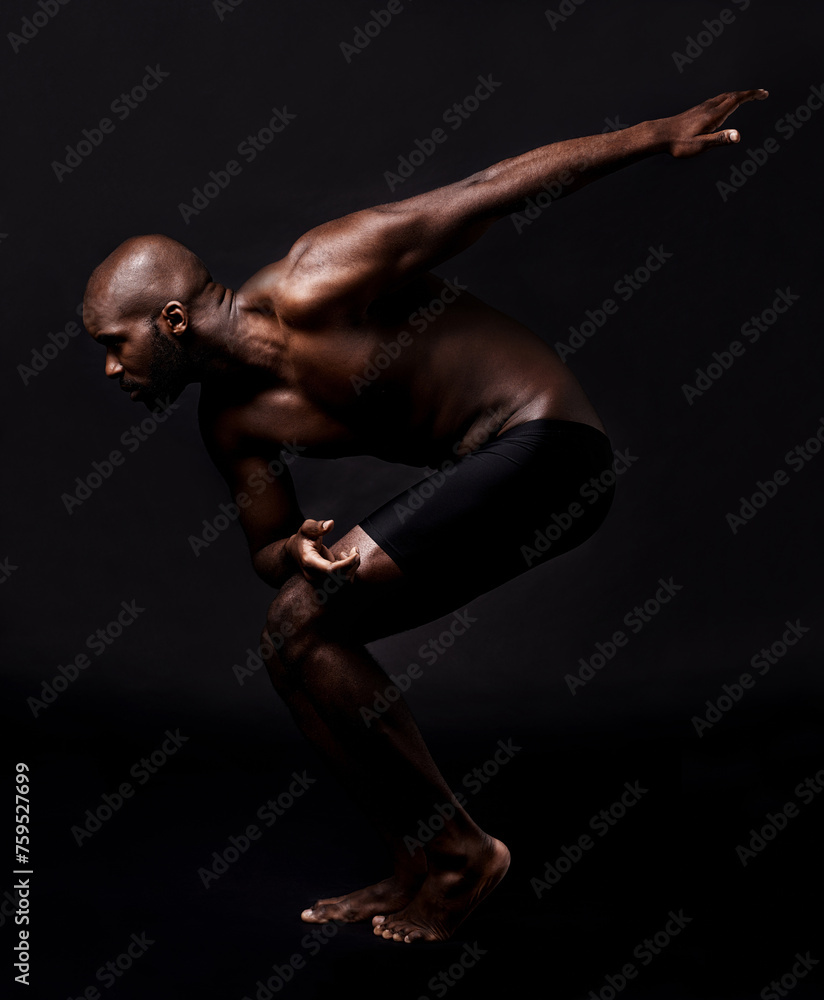 Body, stretching and man on dark background with health, wellness and fitness or ready for running in studio. Young person, athlete or african model in art deco for dance, training or muscle training