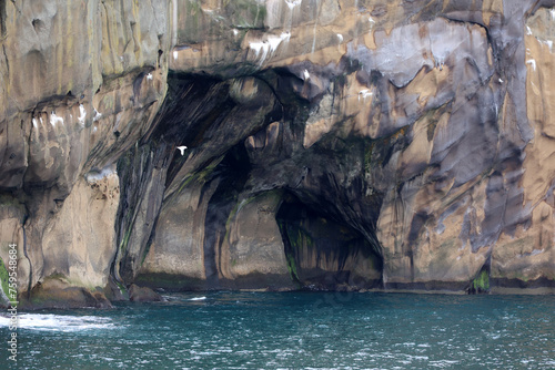 Rock cave on the coast of Heimaey island- Vestmannaeyjar- Westman Islands-Iceland    photo