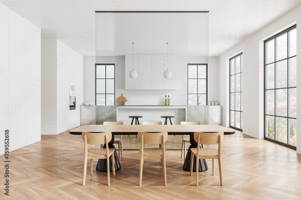 Fototapeta premium Luxury home kitchen interior with eating table, glass partition and bar counter