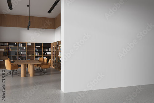 Modern office meeting room interior with table and chairs, shelf and mockup wall