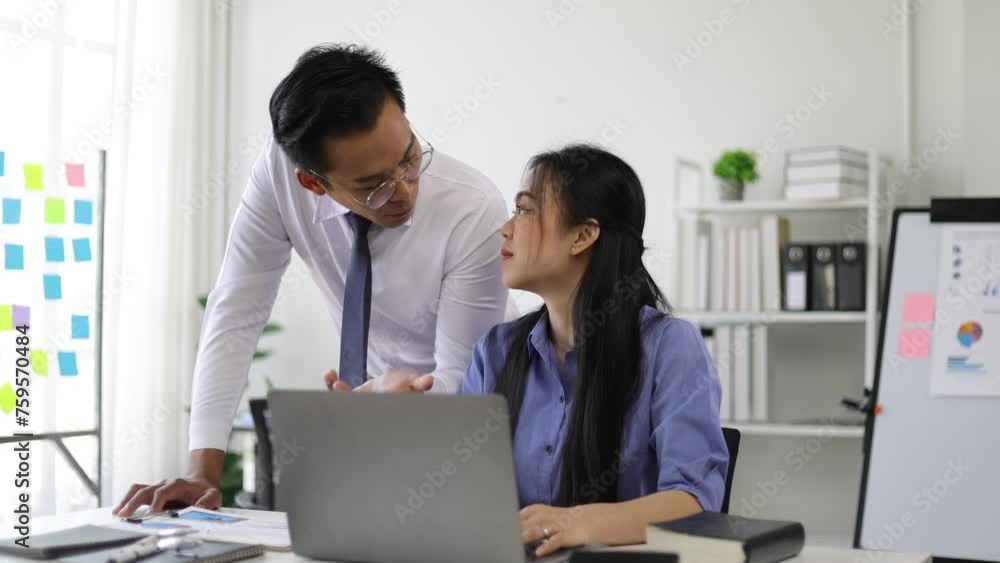 Coworkers are talking while working in the office. Businessman and businesswoman are discussing planning new company projects. Coworkers are talking while working in the office. Businessman and businesswoman are discussing planning new company projects.