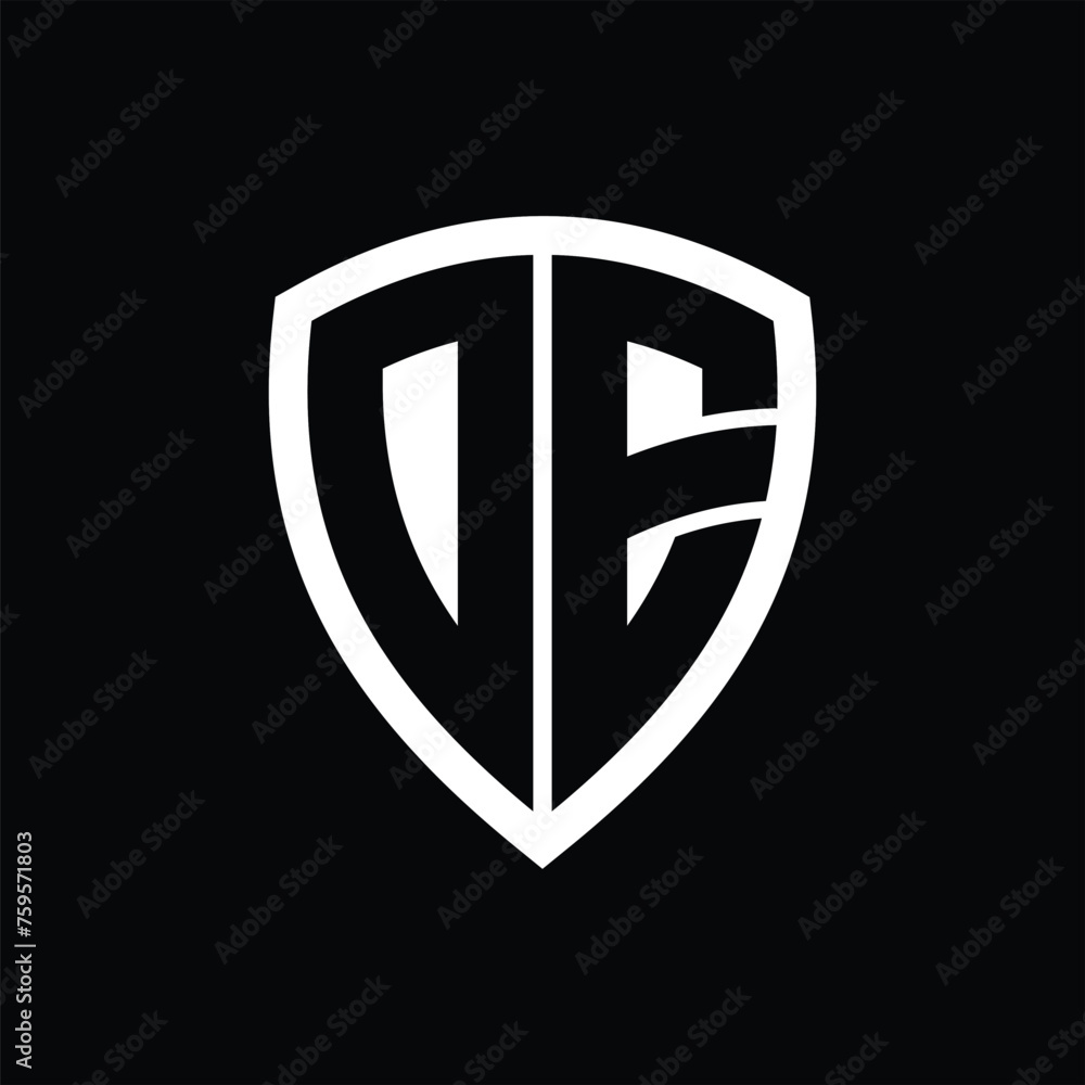 DE monogram logo with bold letters shield shape with black and white color design DE monogram logo with bold letters shield shape with black and white color design