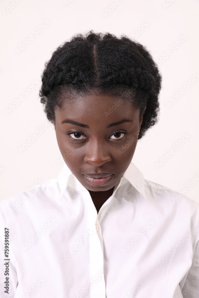 Vertial close-up portrait of confident African American young woman looking at the camera. Mindset. Vertial close-up portrait of confident African American young woman looking at the camera. Mindset.