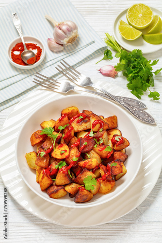 Wallpaper Mural fried spanish potatoes with paprika sauce in bowl Torontodigital.ca