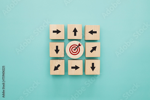 Confused goals. Arrows facing the opposite direction from target. Unfulfilled goals photo