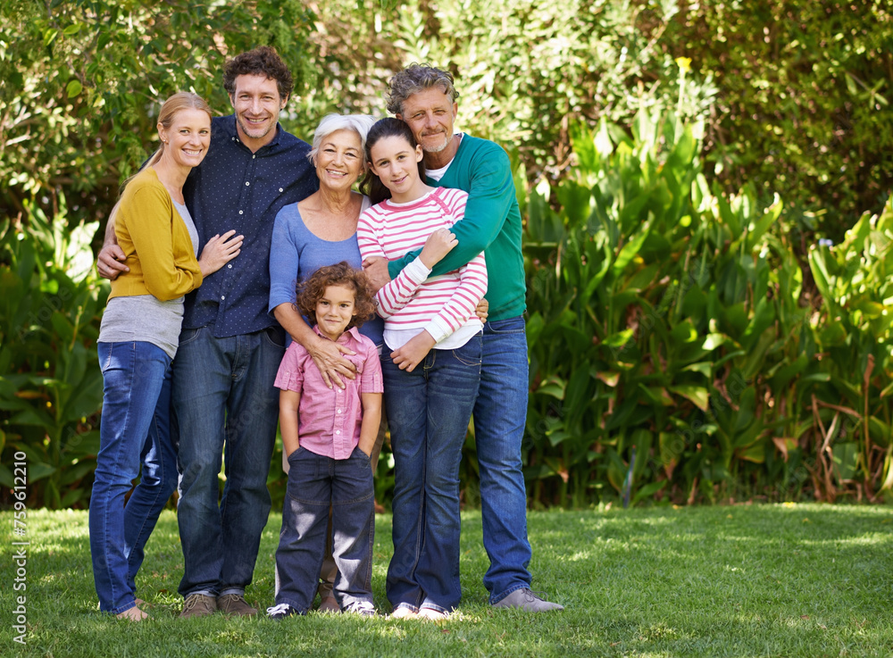 Fototapeta premium Family, portrait and hug in outdoor nature, love and bonding together or happy in backyard. Generations, smile and peace or embrace for support in garden or park, vacation and holiday in France