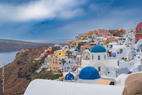 View of Oia town on Santorini island in Greece. Travel mediterranean aegean of traditional cycladic Santorini white houses