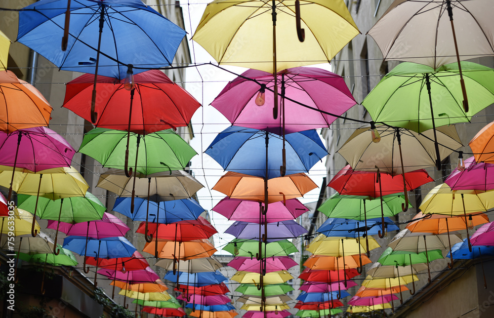 The dеcor is made of multi-coloured umbrellas.