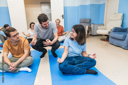 An engaging group yoga session, including a participant with Down Syndrome