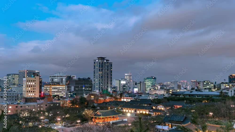 Time Lapse city skyline at night Namsangol Hanok Village Seoul South Korea Time Lapse city skyline at night Namsangol Hanok Village Seoul South Korea