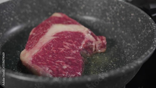 steak in a frying pan