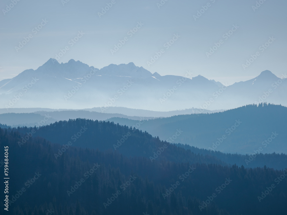 Mountain landscape.. Many visible plans - hill ranges. View of the Tatra Mountains from the Pieniny Mountain Range. Slovakia.