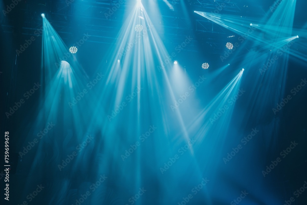 Spotlights illuminate empty stage blue background - obrazy, fototapety, plakaty 