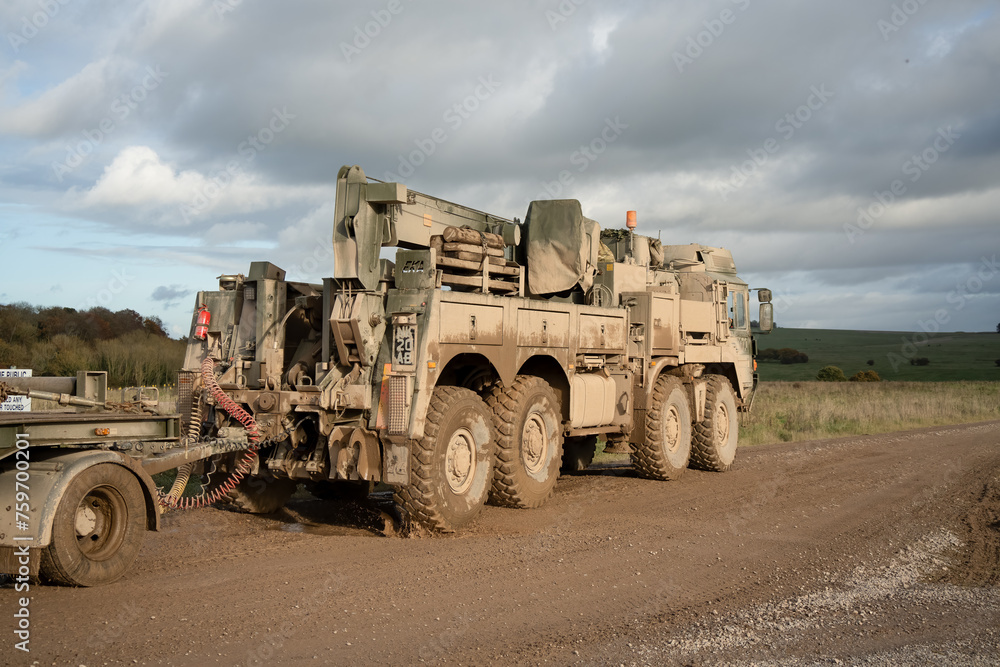 Obraz premium British army MAN SVR (Support Vehicle Recovery) 8x8 Truck pulling a trailer, Wiltshire UK