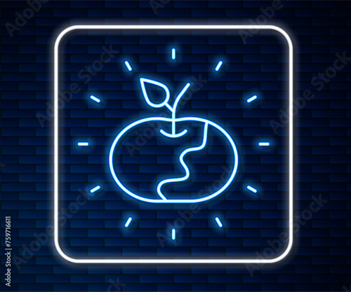 Glowing neon line Poison apple icon isolated on brick wall background. Poisoned witch apple. Vector