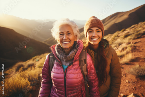 Mother and daughter hiking photo