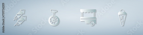 Set Firework rocket, Unicycle, Fast street food cart and Ice cream in waffle. Paper art style. Vector