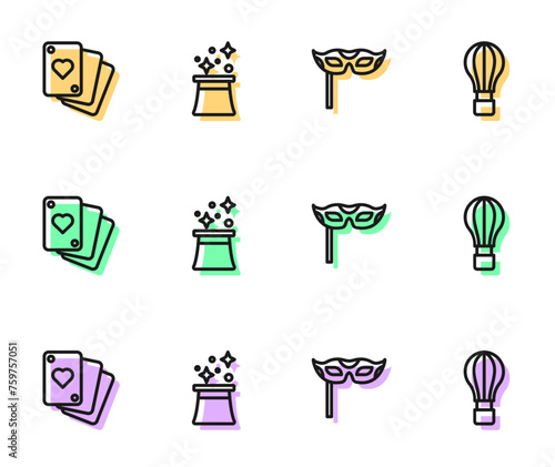 Set line Festive mask, Playing cards, Magician hat and Hot air balloon icon. Vector