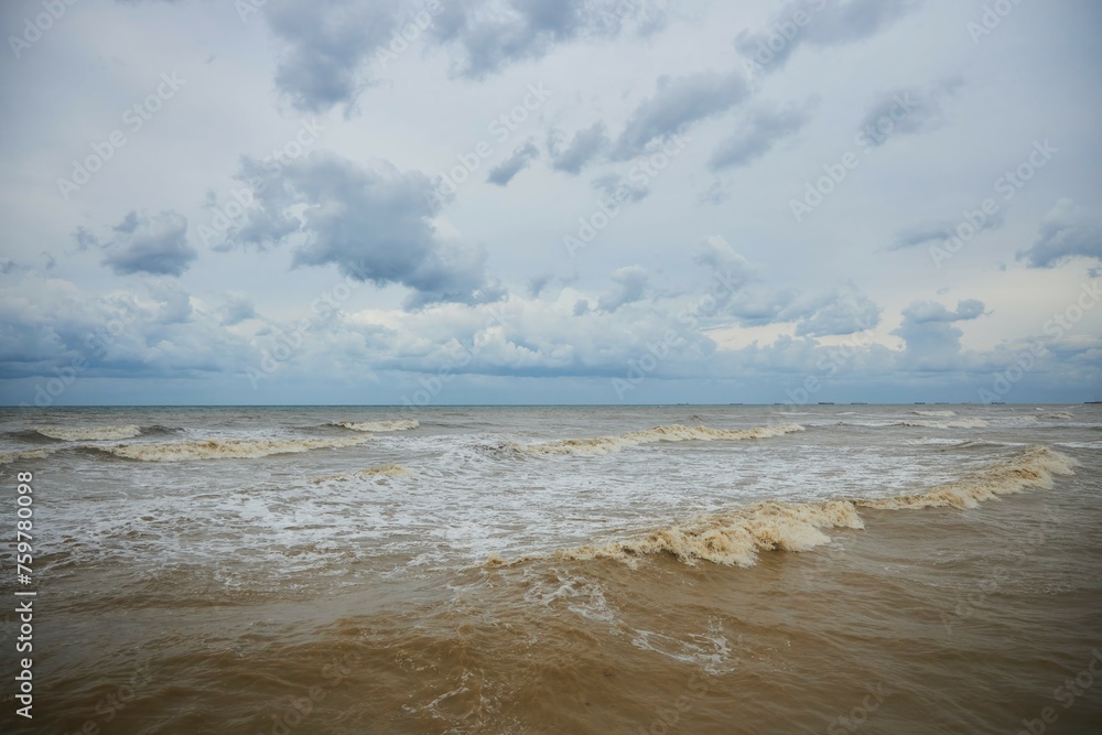 The sea or the ocean during a storm. Dirty sea waters. High waves