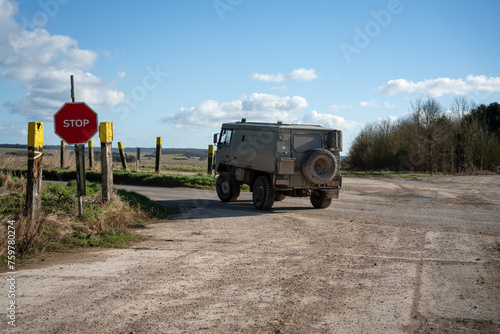 British army bae systems, Puch, Daimler, Pinzgauer High-Mobility All-Terrain 4x4 vehicle on a military battle exercise, Wilts UK photo