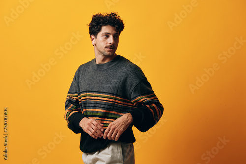 Man orange trendy happy fashion background sweater portrait