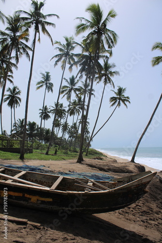 Old boat on the beach, cape coast, in Ghana