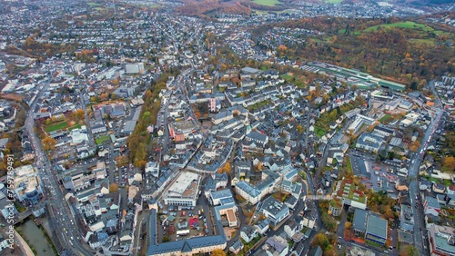 Aerial of the old town in the city Siegen on an overcast day in autumn in Germany.	