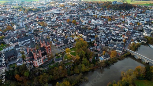 Aerial of the old town around the city Limburg in Germany on a cloudy noon in fall
