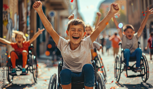 Smiling kids in wheelchairs celebrating victory, holding up their arms and cheering with friends on the street photo