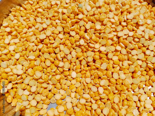 Toor Dal,Close up of Organic Bengal Gram (Cicer arietinum) or split yellow chana dal Full-Frame Background. Top View photo