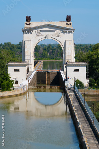 Arch of the first shipping lock of the Volga-Don Canal on a sunny June day. Volgograd