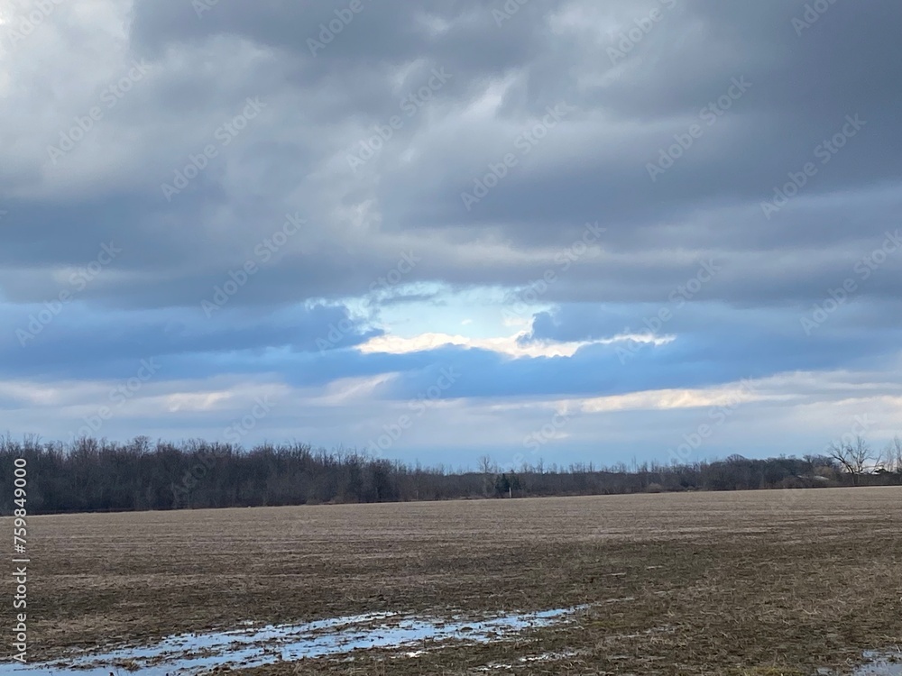 Opening in the clouds in the sky, change of weather, sign of change Opening in the clouds in the sky, change of weather, sign of change