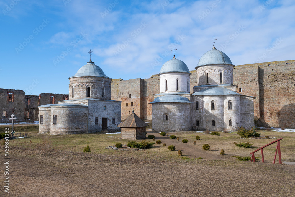 View of the ancient temples of the Ivangorod fortress on a sunny March day. Leningrad region, Russia