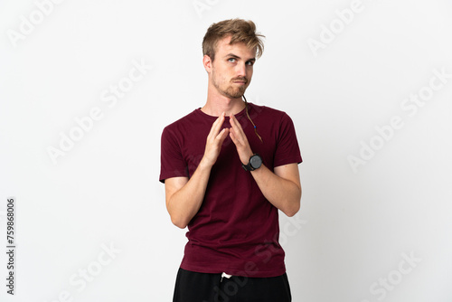 Young handsome man isolated on white background scheming something