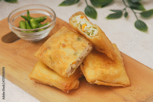 Martabak Tahu   Indonesian traditional food made from tofu and mix with vegetables and eggs. 