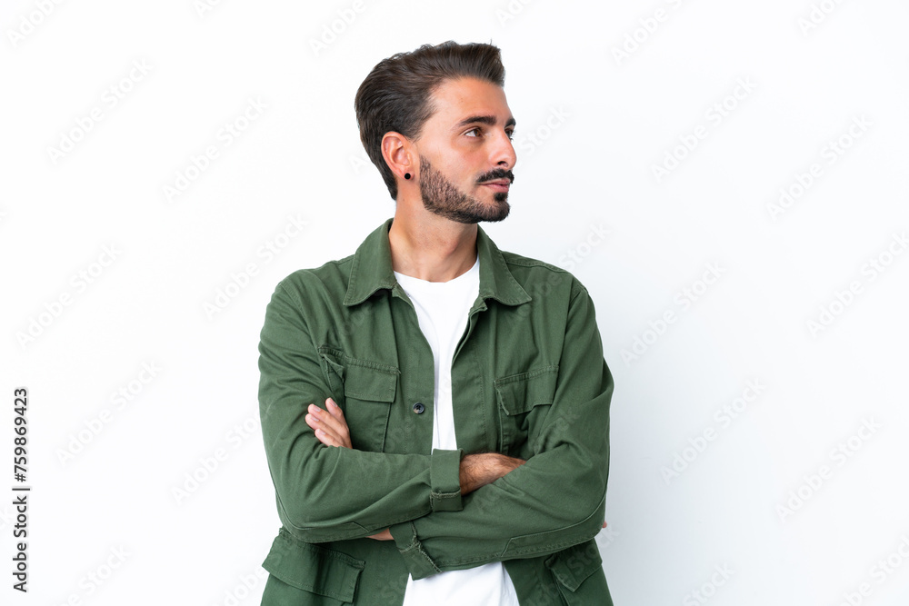 Young caucasian man isolated on white background looking to the side Young caucasian man isolated on white background looking to the side