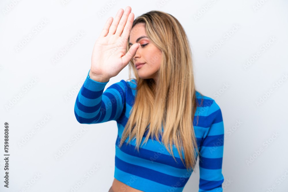 Young caucasian woman isolated on white background making stop gesture and disappointed Young caucasian woman isolated on white background making stop gesture and disappointed